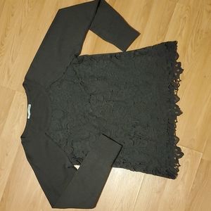 Maurices Size Large Blouse with Lace. The Color is Black.